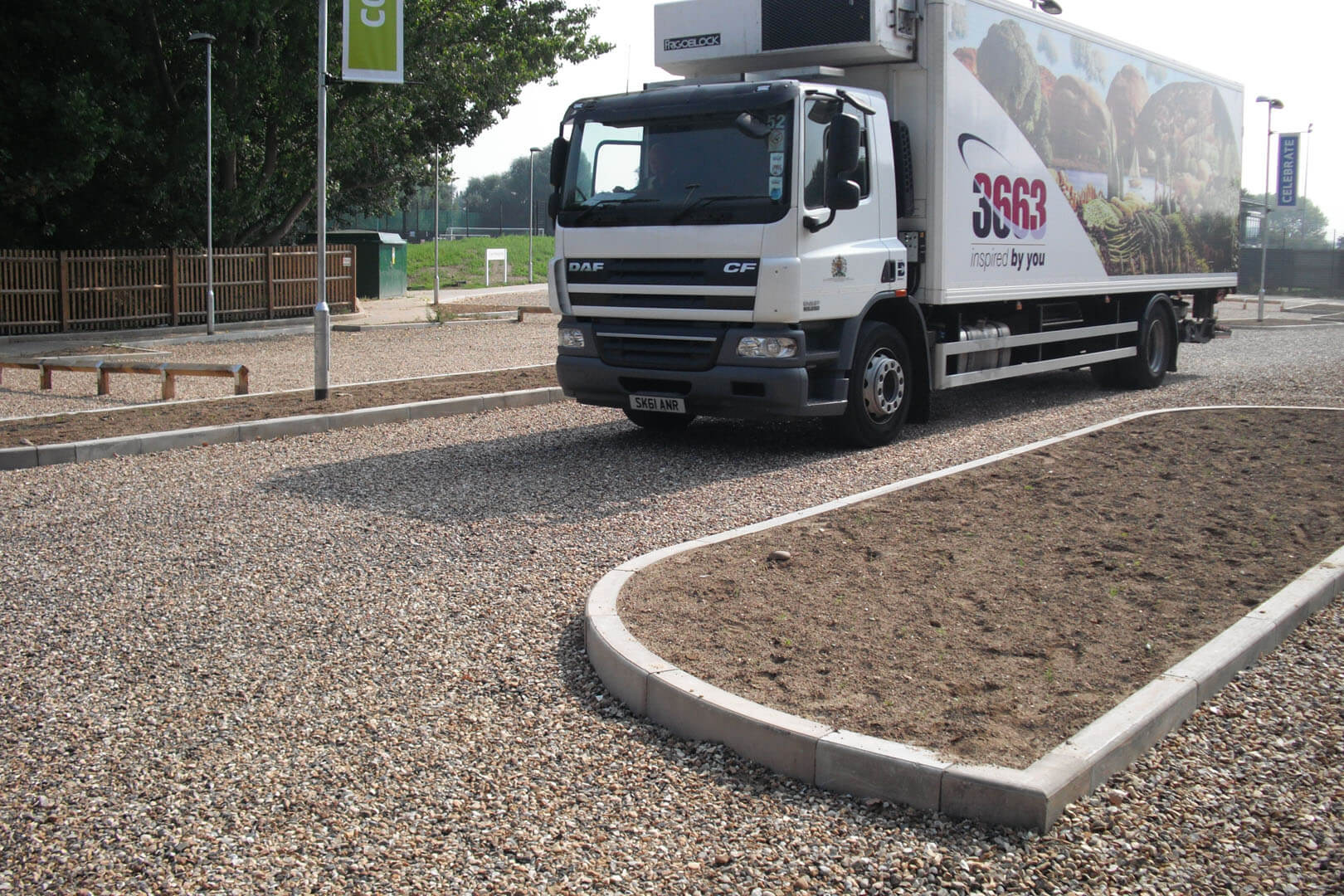 Gravel driveway with lorry
